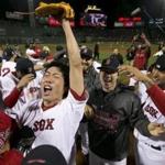 Red Sox Koji Uehara pitcher celebrated with teammates during Game Six of the World Series.